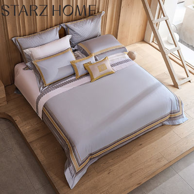 Des ensembles de literie en patchwork en coton Pima dans un style de design moderne de luxe