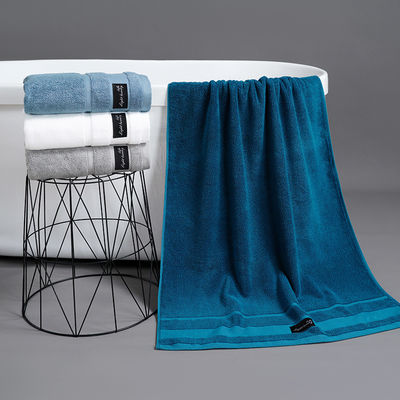 Hôtel de luxe 100% coton bain blanc ensemble de serviette pour le visage avec logo brodé sur mesure
