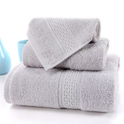 Serre-serviette absorbante de coton pur en trois pièces avec grille beige et couleur solide