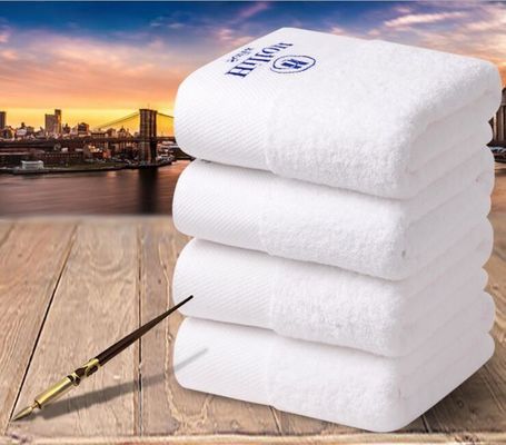 Des serviettes en coton pur 100% sur mesure, à haute absorption d'eau, parfaites pour la maison et l'hôtel.