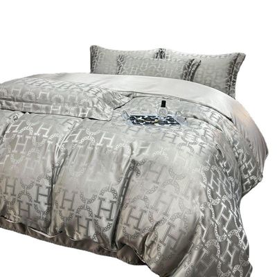 40 Compte de tissu Légère Luxe Satin Jacquard Four Piece Lit Ensemble pour les marchés de pays