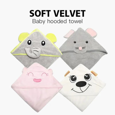 Une serviette de bain en tricotée avec un logo personnalisé et un design d'éléphant.