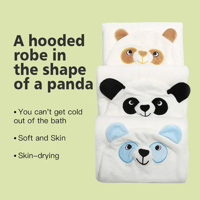 Une serviette de bain en tricotée avec un logo personnalisé et un design d'éléphant.