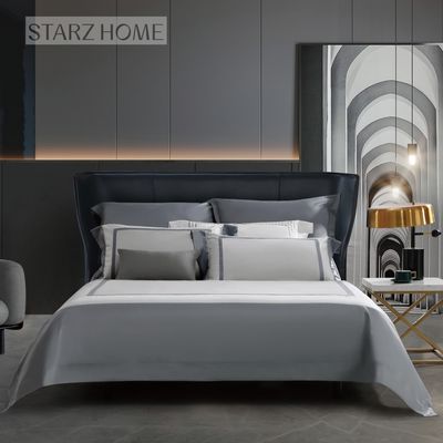 Un ensemble de draps de lit moderne et simple 100% coton pour toute saison