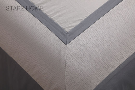 Un ensemble de draps de lit moderne et simple 100% coton pour toute saison