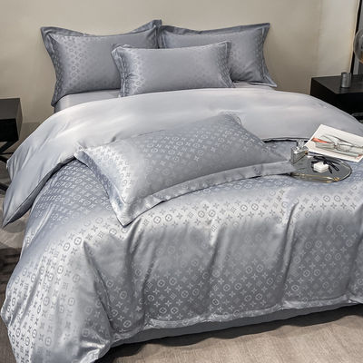 Ensembles de literie Jacquard personnalisés de luxe Collections 4 pièces Ensembles de couverture de couette d'oreiller