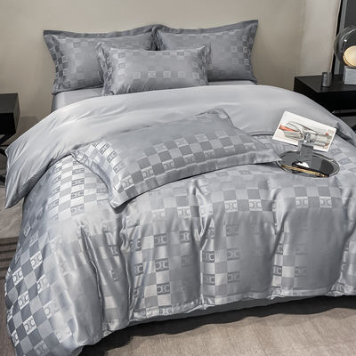 Ensembles de literie Jacquard personnalisés de luxe Collections 4 pièces Ensembles de couverture de couette d'oreiller