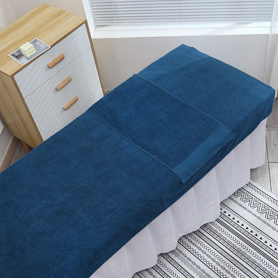 Une serviette de bain en coton de tissage ordinaire et des serviettes personnalisables pour les centres de bien-être