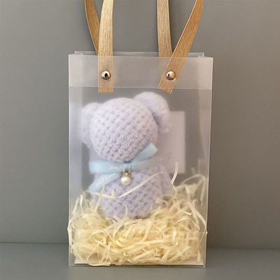 Une serviette d'ours d'ananas de couleur solide, mignonne, en forme d'ours de lapin, en laine de corail, une serviette pour la maison.