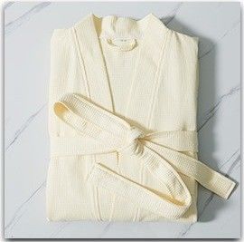 Des robes de salon de beauté avec un logo personnalisé vous éblouissent et impressionnent vos invités