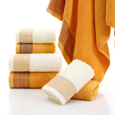 Des serviettes d'hôtel en bambou ultra doux en coton personnalisées pour adultes tissées en couleur solide