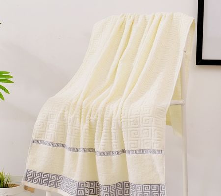 Des serviettes pour le visage de luxe tissées avec du coton 100% peigné hypoallergénique et du design