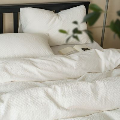 Composition en coton pur en quatre pièces de qualité A non blanchi, propre à la peau pour mère et bébé