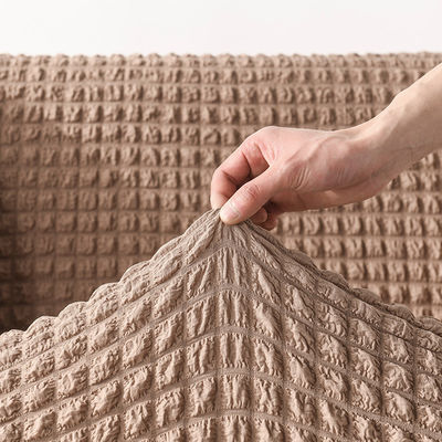 Couvertures de canapé super élastique à trois places en style luxe léger avec tissu Seersucker