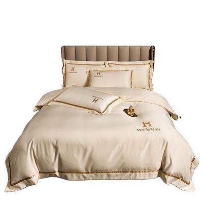 Ensemble de literie haut de gamme Couverture de couette en soie simple Ensemble de quatre pièces pour les exigences du client