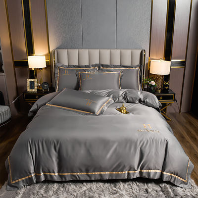 Ensemble de literie haut de gamme Couverture de couette en soie simple Ensemble de quatre pièces pour les exigences du client