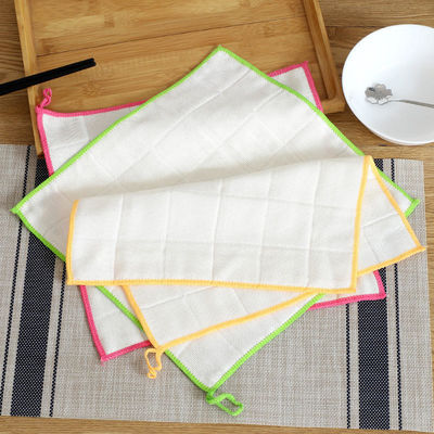 Des serviettes de cuisine en fibre de bois de bambou, de forme carrée, avec un logo personnalisable, et des serviettes de cuisine en coton