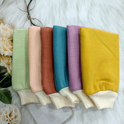 Des gants de pinceau exfoliants pour les gommages turcs, un décapant pour le bain en forme de rectangle