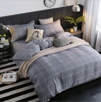 Un ensemble de literie de lit de chambre d'hôtel personnalisé pour des nuits confortables et élégantes
