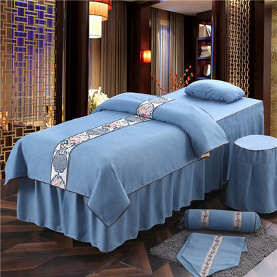 Masseuse de style moderne, couverture de table, lit en microfibre pure.